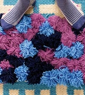 haz-un-tapete-con-pompones-de-lana-thumbnail