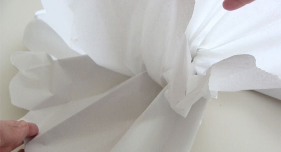 como hacer pompones 10